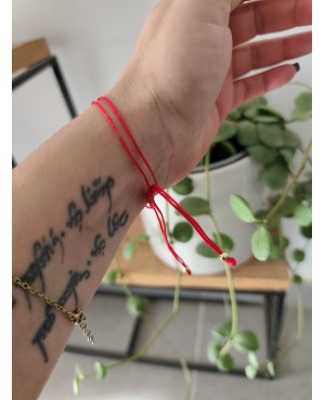 Bracelet fil rouge
